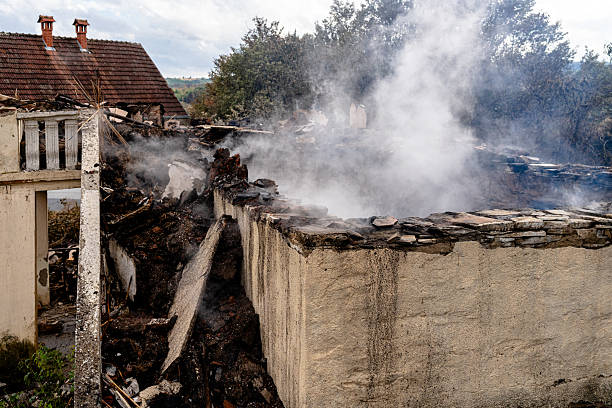 Professional Fire Damage Restoration technician working in Three Bridges, NJ